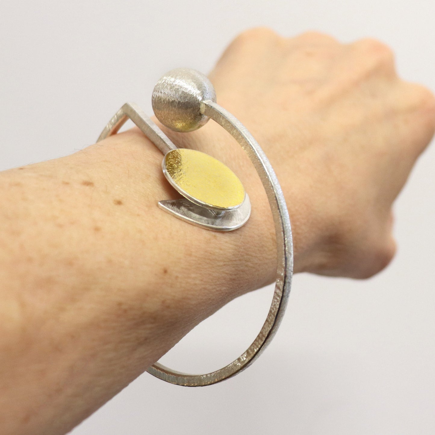 Inverse-G brutalist statement bangle silver gold handmade bracelet