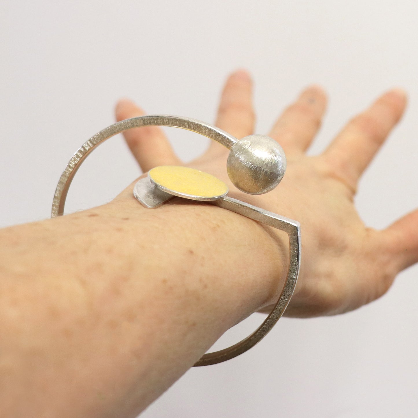 Inverse-G architectural statement bangle silver gold handmade bracelet