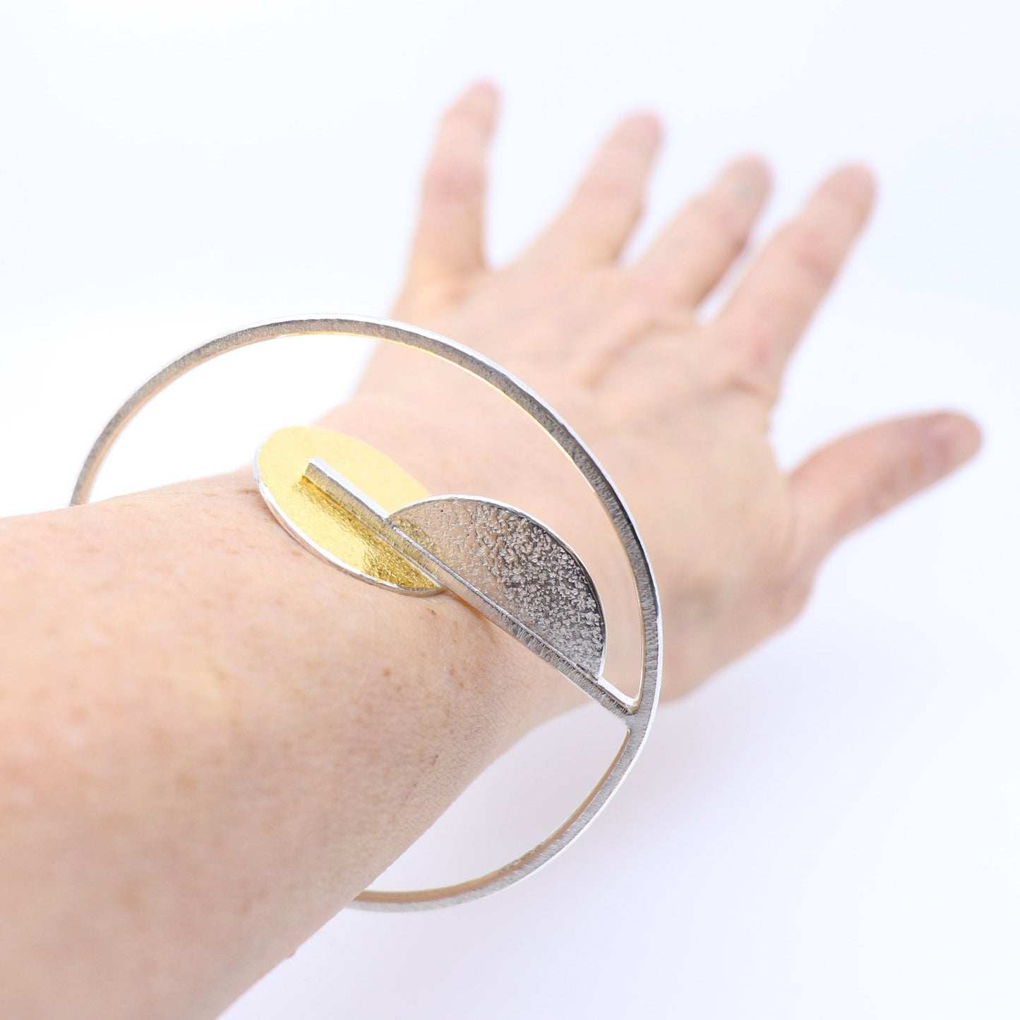 Inverse-O architectural statement bangle silver gold handmade bracelet