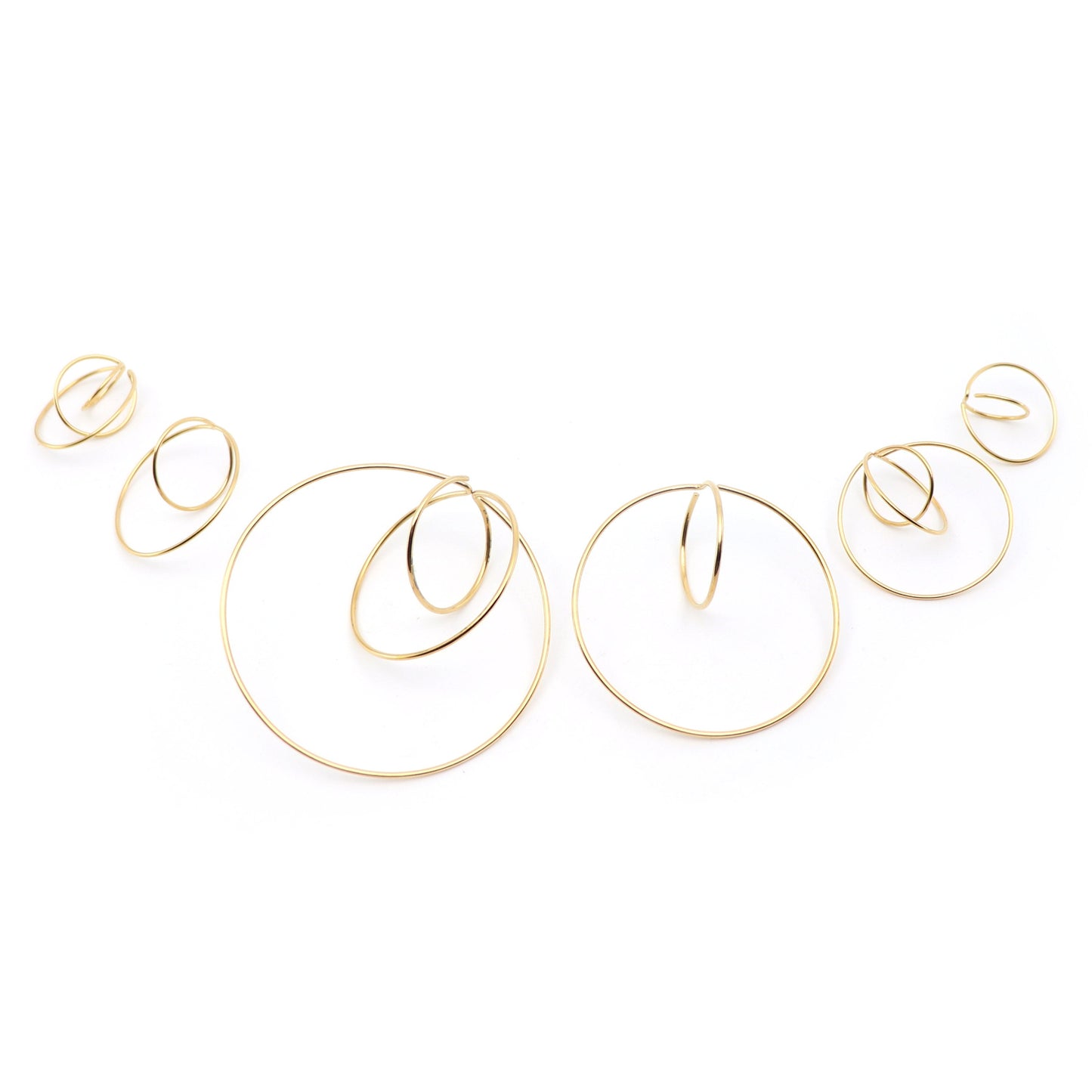 comparison of all atomic and subatomic earrings in gold