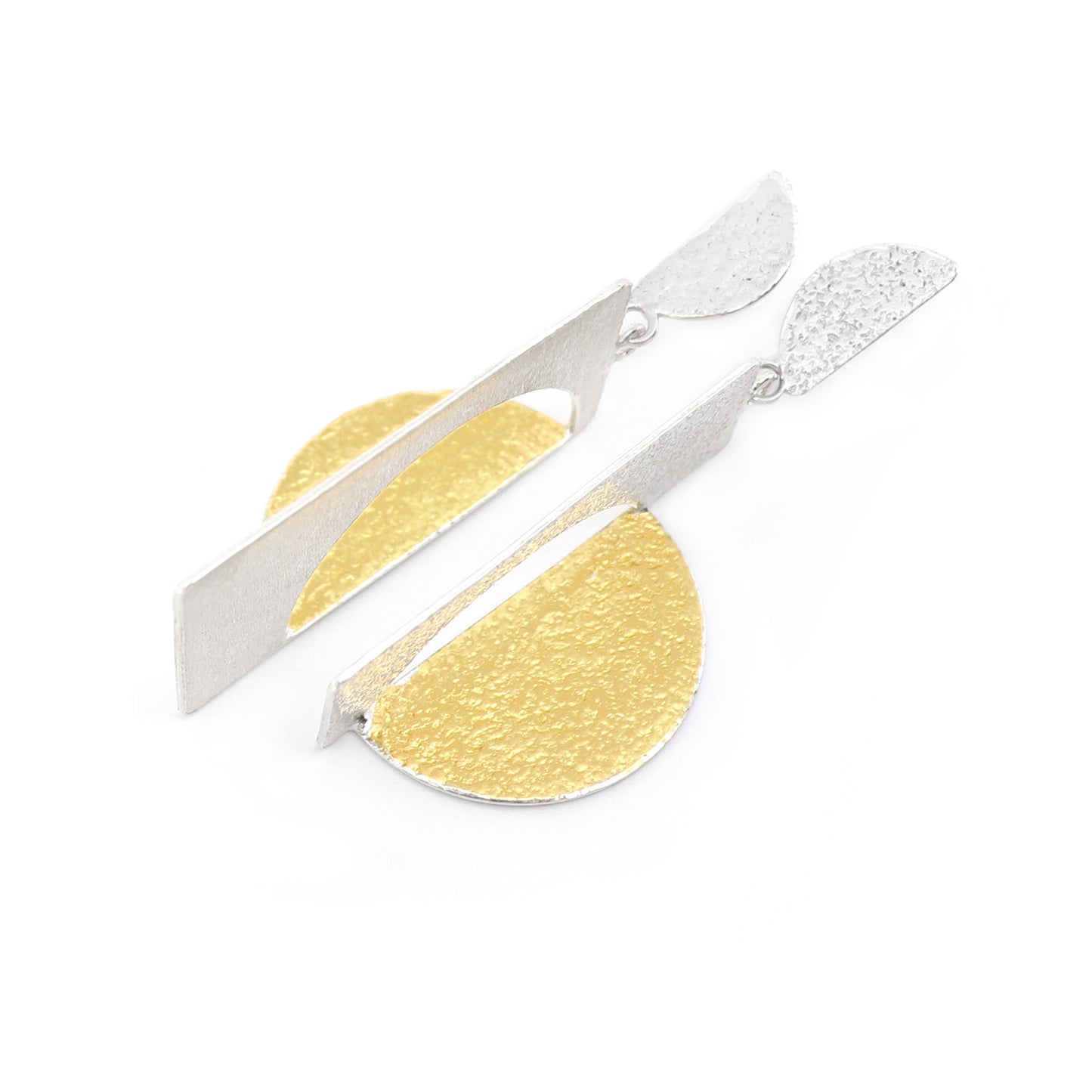 Transposed large statement silver and gold handmade earrings