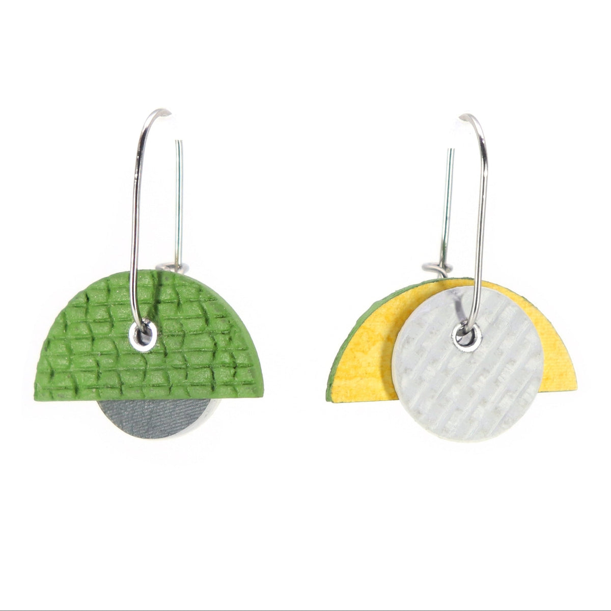 Reversible linoleum earrings on oval hoop in yellow & white or green & grey