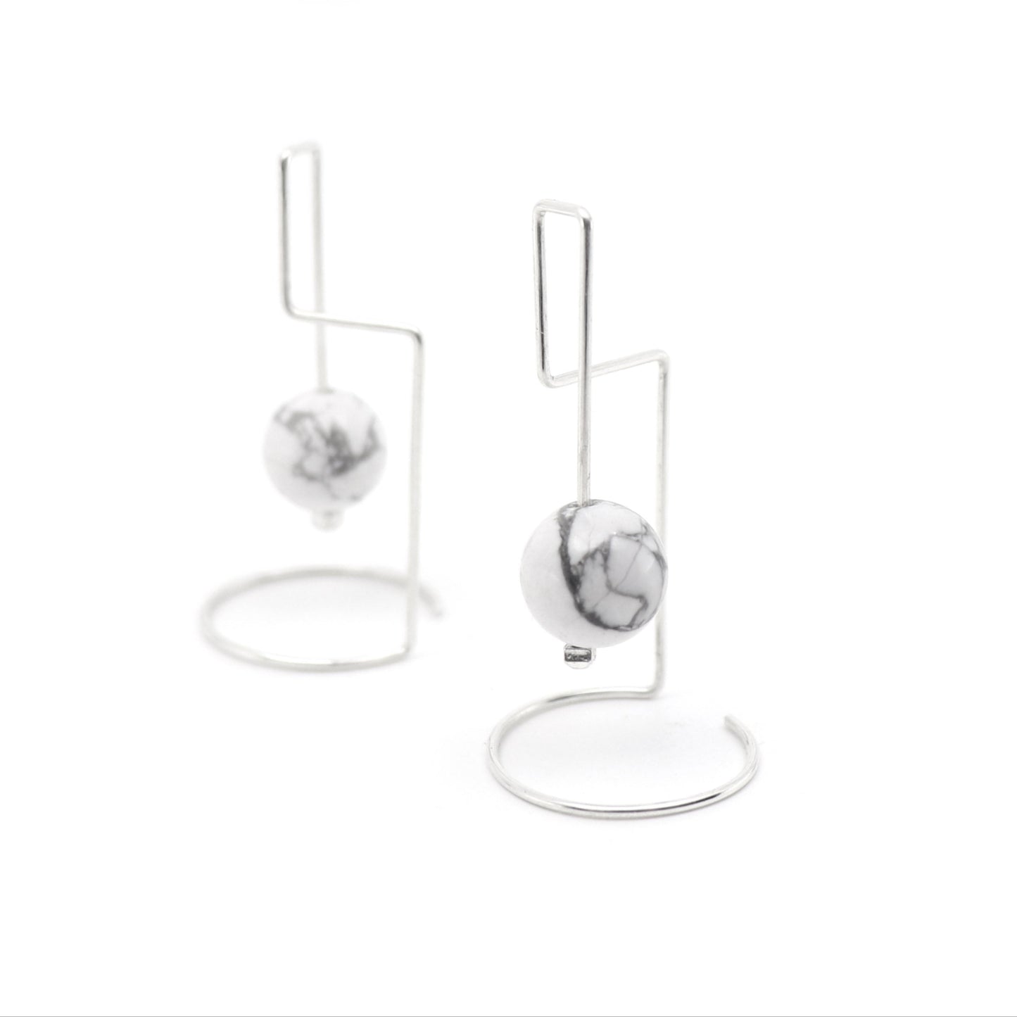 Geometric silver earrings with howlite beads