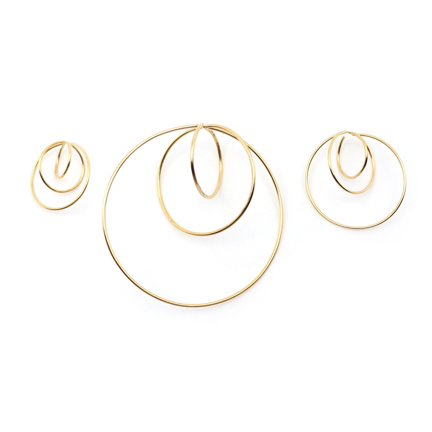 size comparison of 3 atomic earrings