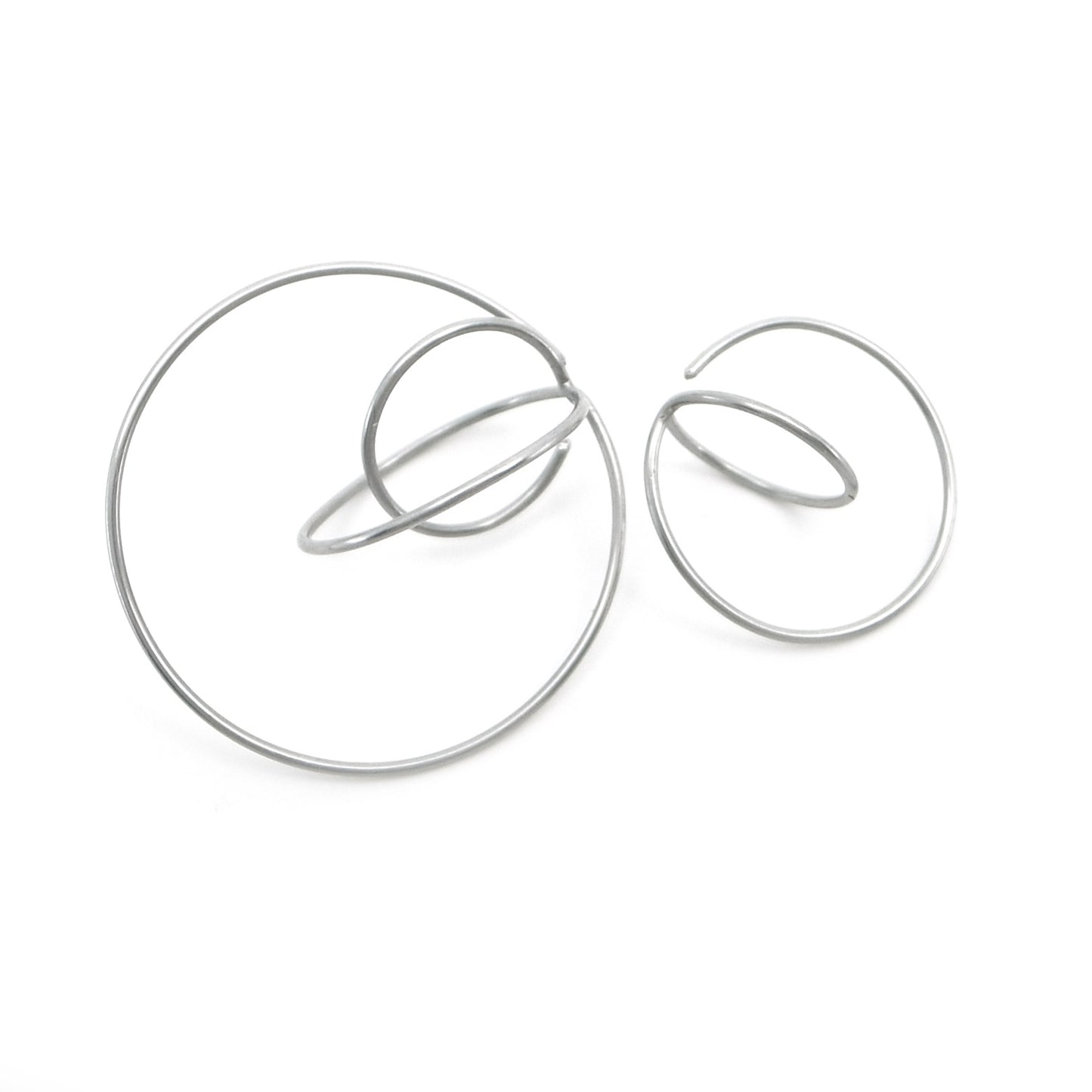 mismatched steel earrings