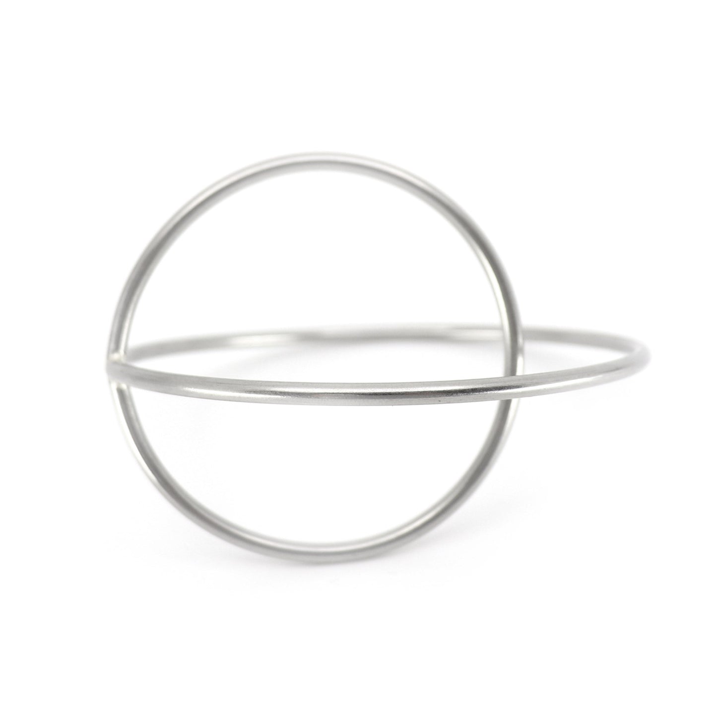 statement steel bangle with white background