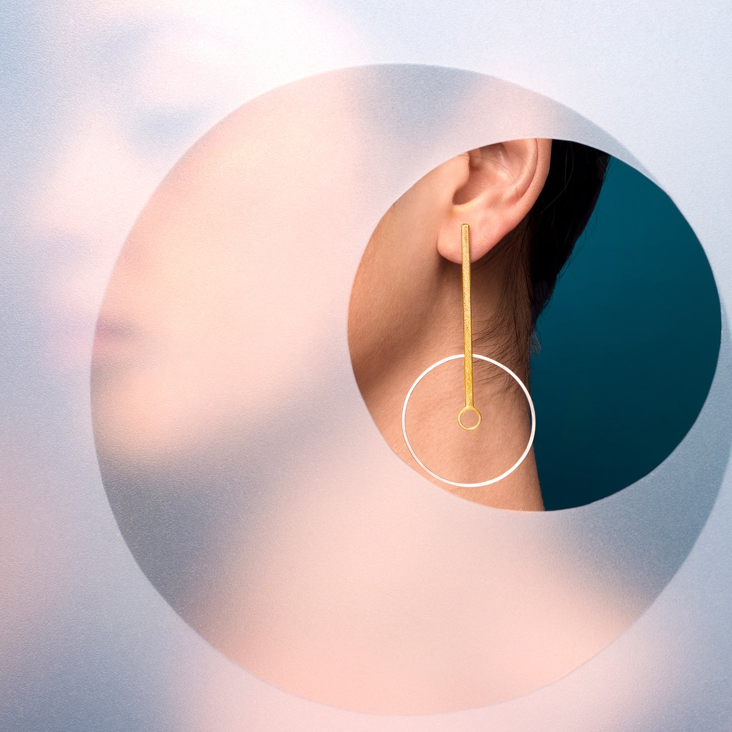 geometric statement earring on model