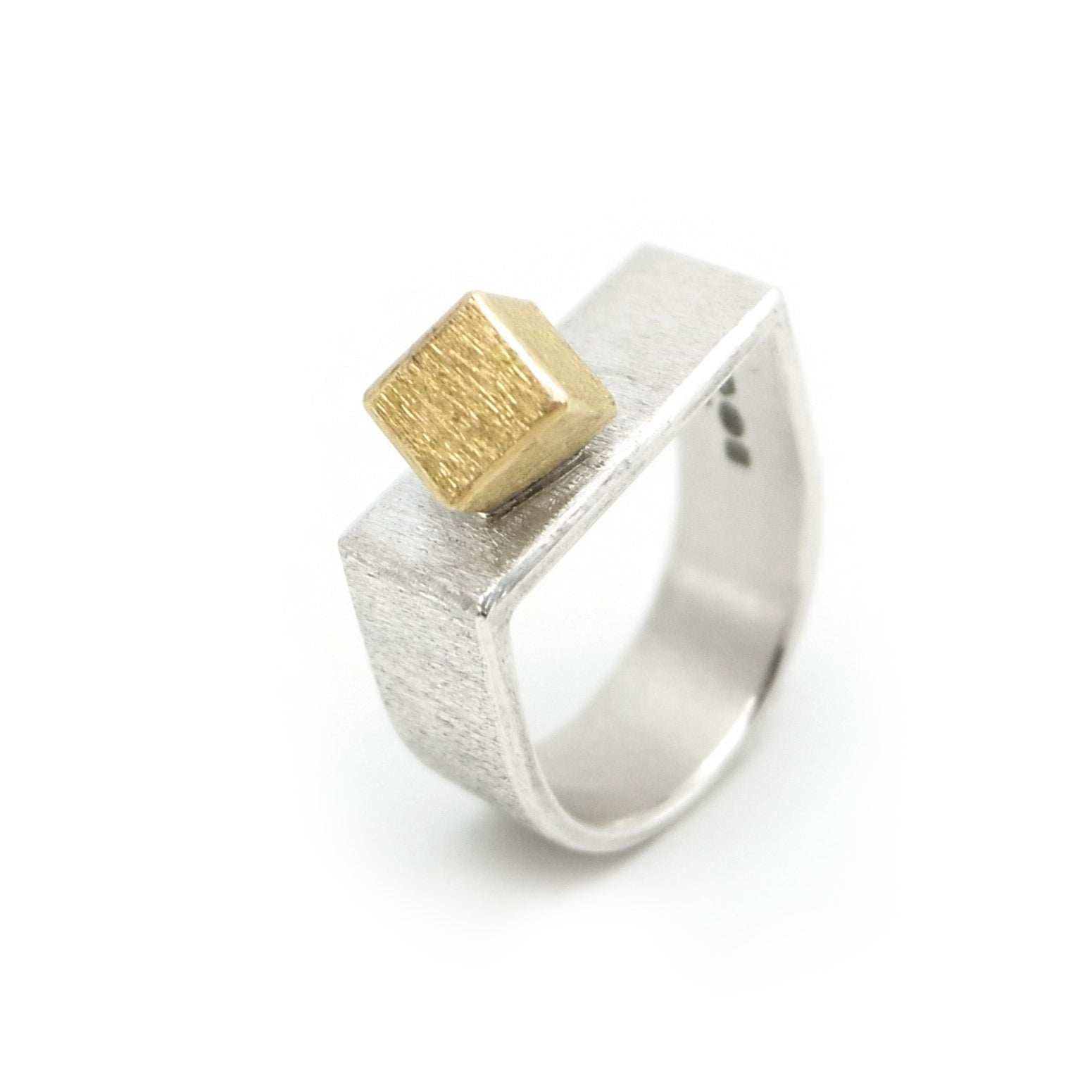 bespoke d-shaped brutalist ring in silver