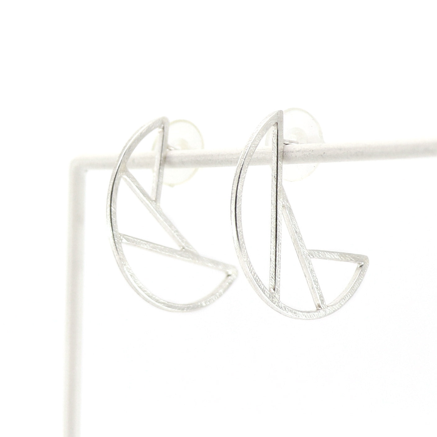 Silver Fibonacci earrings on a white background