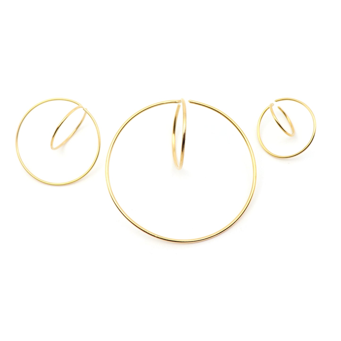3 sizes of subatomic earrings