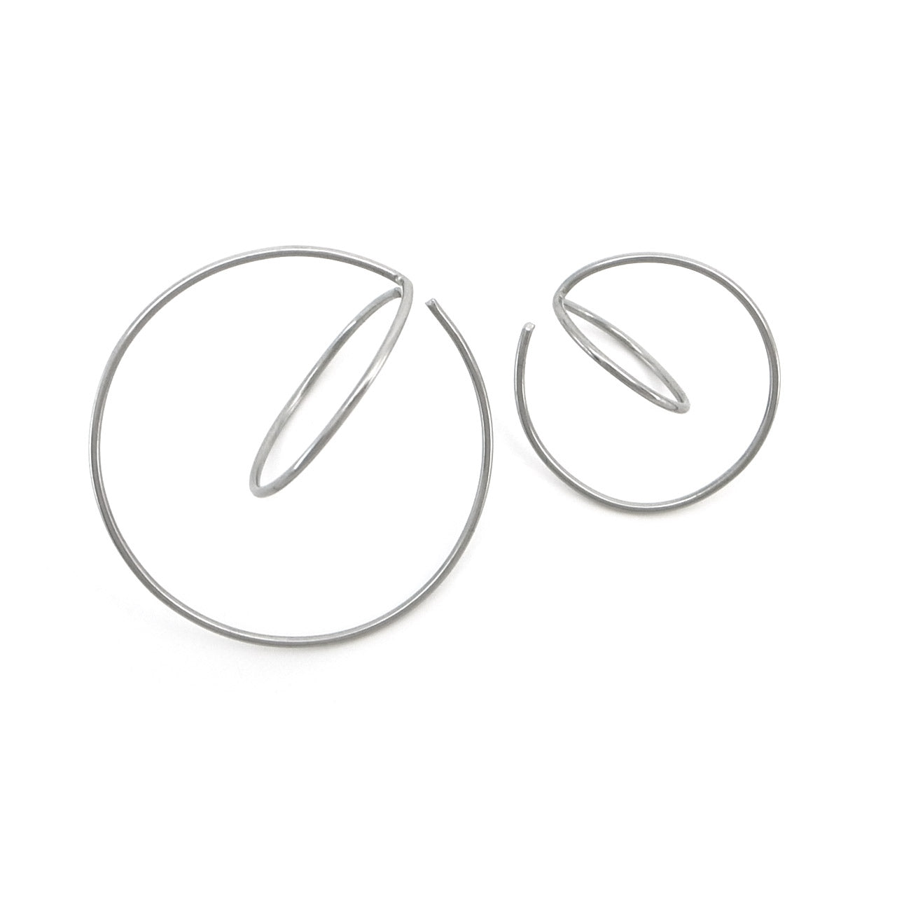 mismatched steel hoop earrings