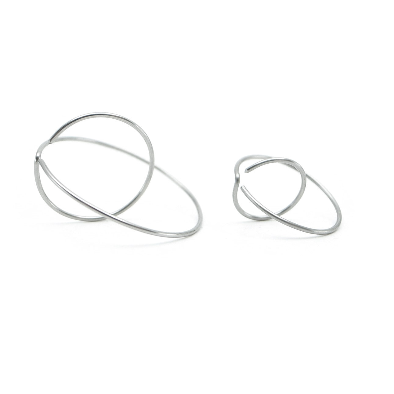 mismatched steel hoop earrings