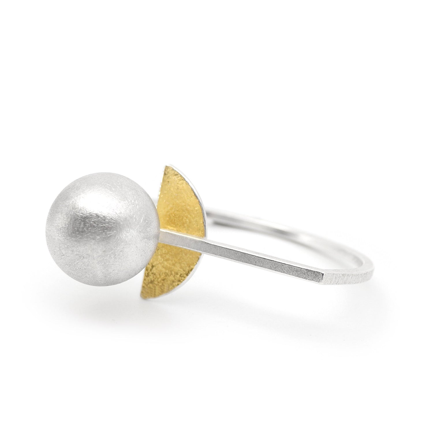 Inverse-A brutalist statement bangle silver gold architectural