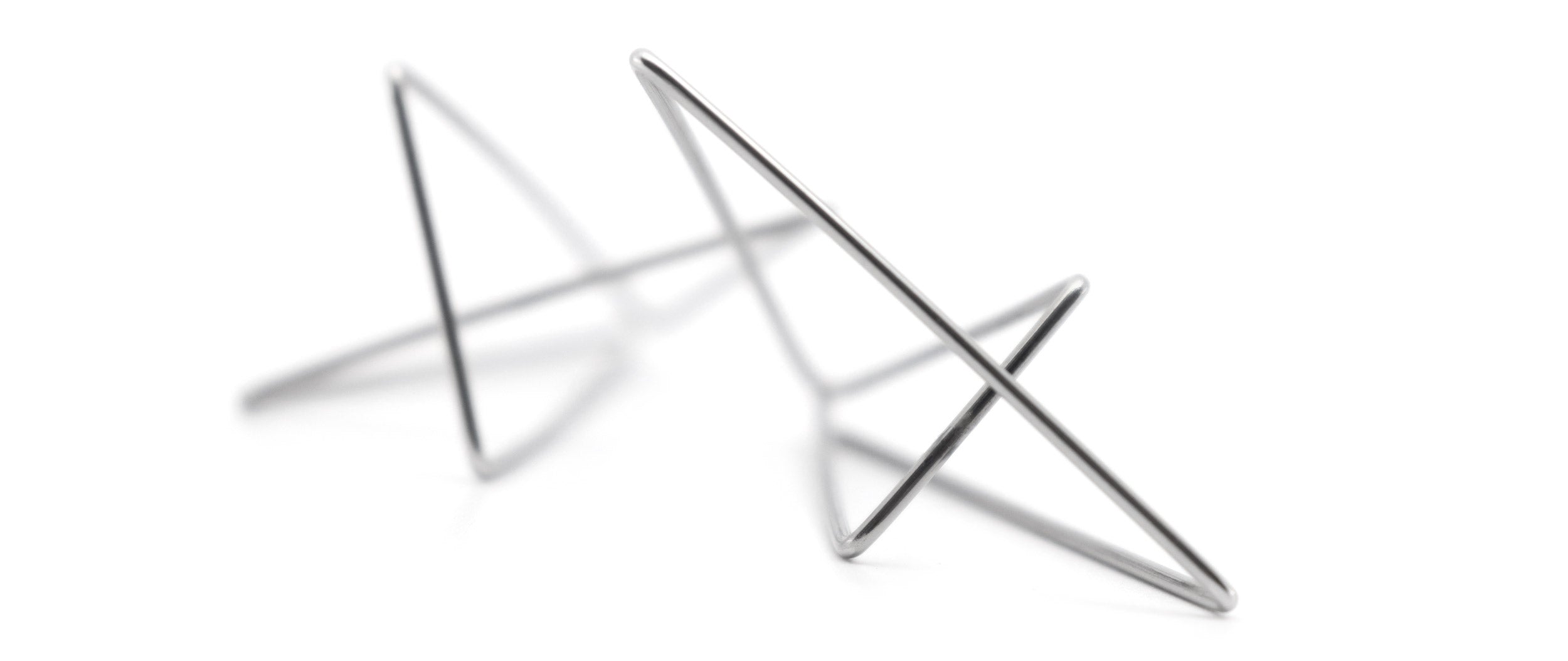 triad steel earring - banner
