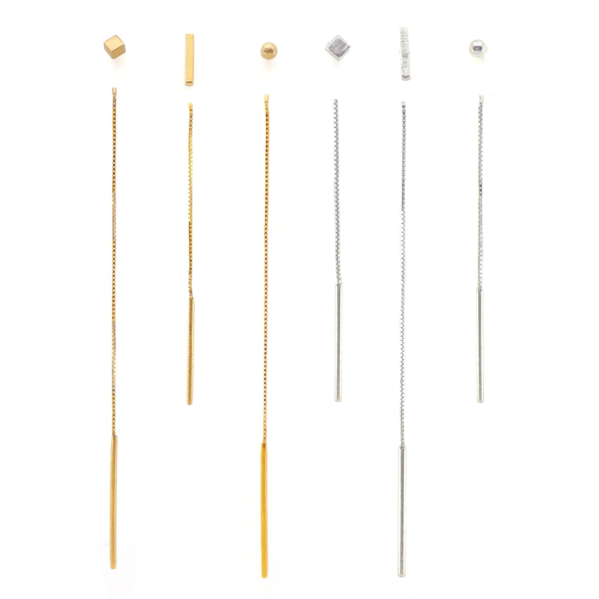 6 different earlace threaders in gold and silver on white background
