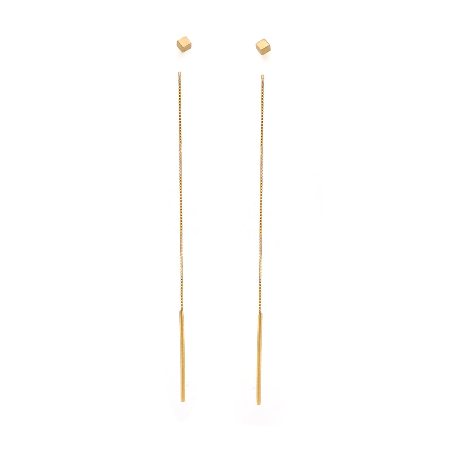 Gold cube threader earrings on a white background