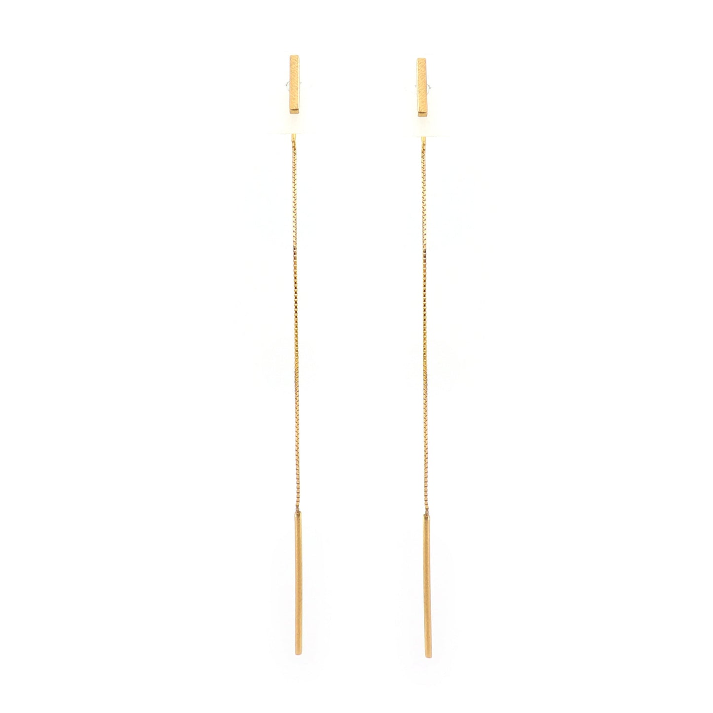 Pair of bar gold earrings on a white background