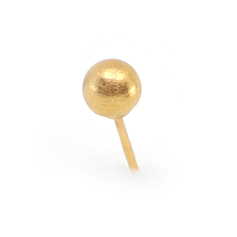 Gold ball-shaped earring on a white background