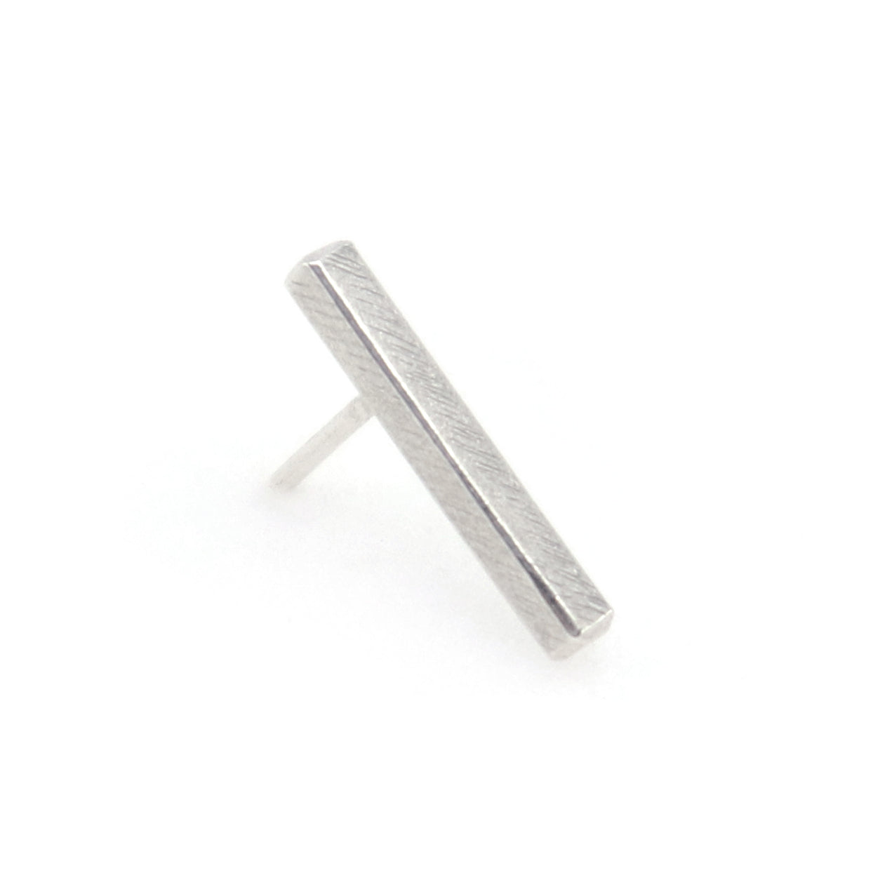 Silver stick stud earring on a white background