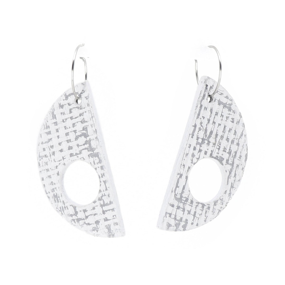Pair of geometric earrings on a white background
