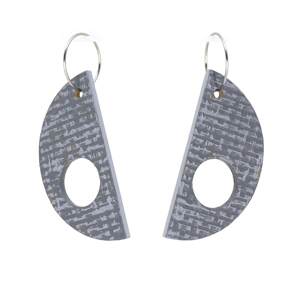 Pair of gray earrings with a geometric design on a white background