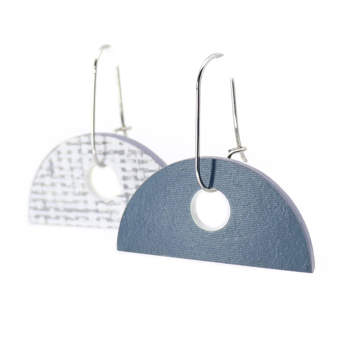semi-circle navy linoleum earrings on oval hoops, reversible with white and grey on backside