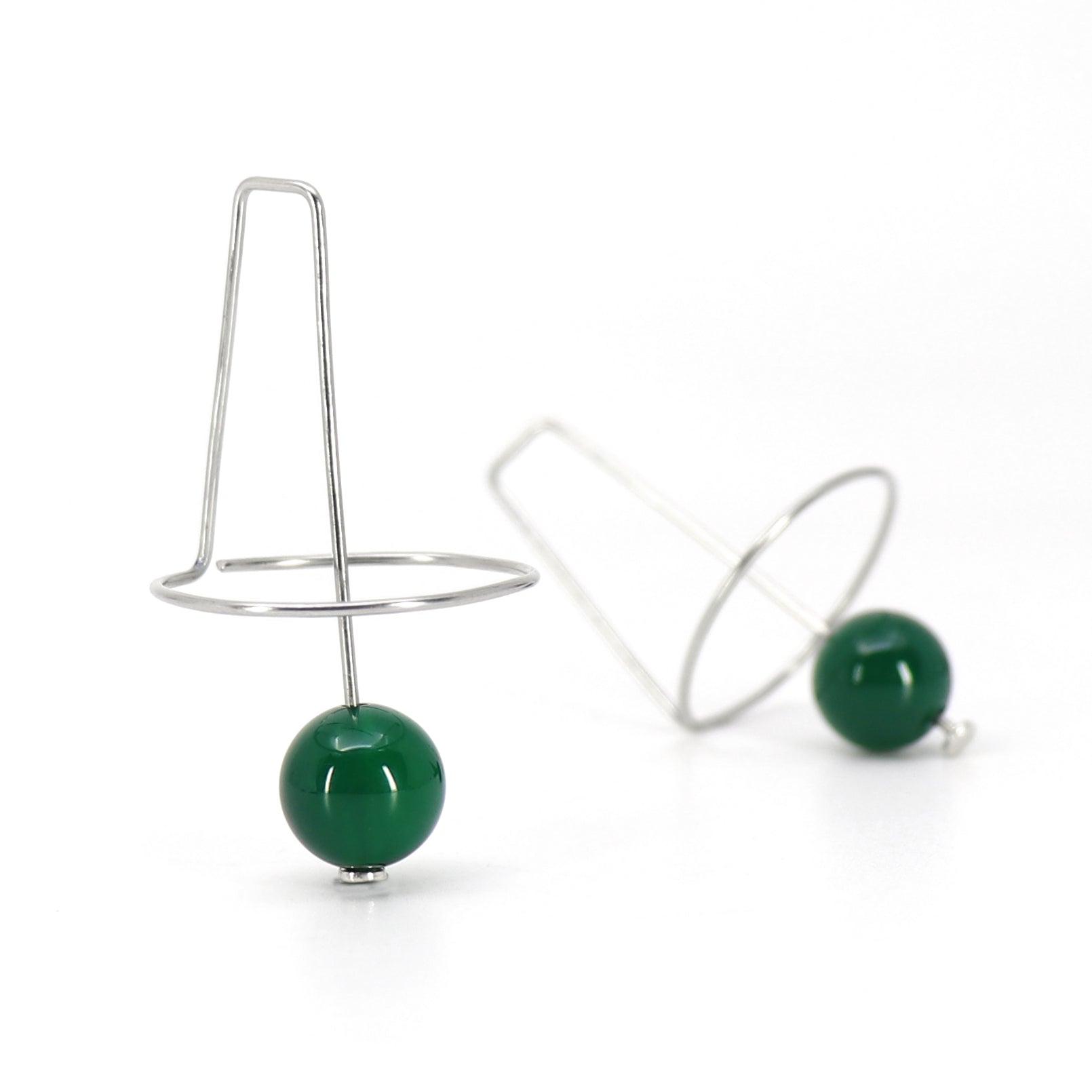 geometric wire earrings with green agate beads on white background
