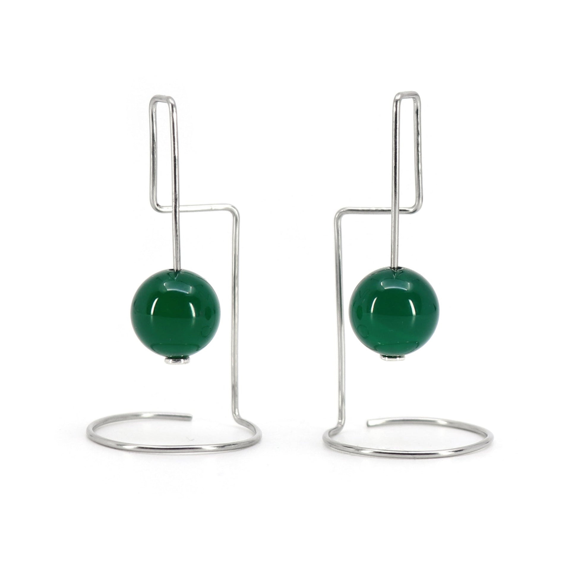 Pair of geometric earrings with green agate beads against a white background