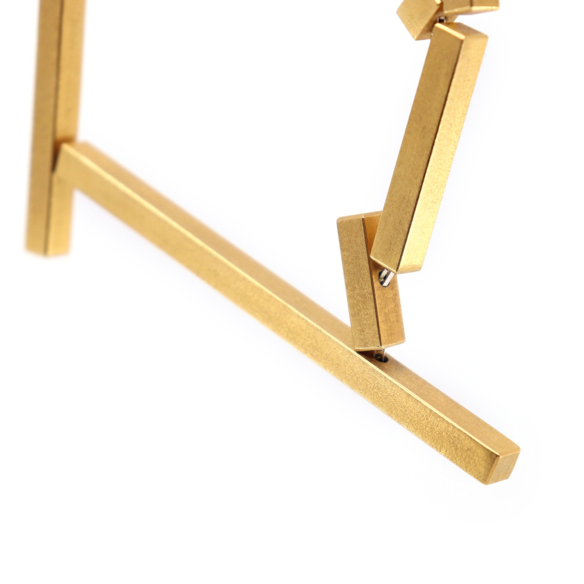 Gold metal components on silver chain 