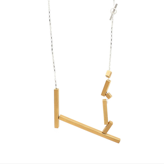 Gold necklace with vertical bars on a white background