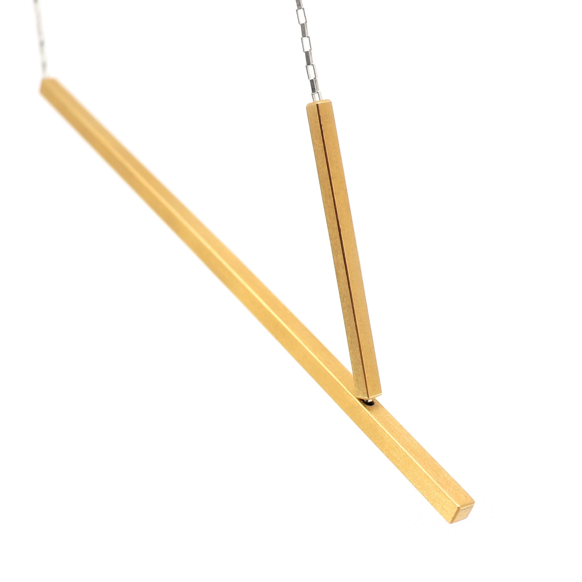 gold necklace with 2 long rectangle components