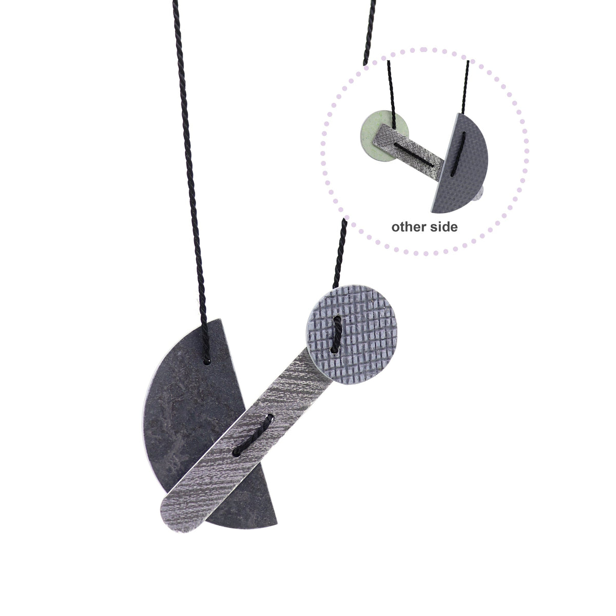 Necklace with geometric pendant on a white background, reverse shown on same image