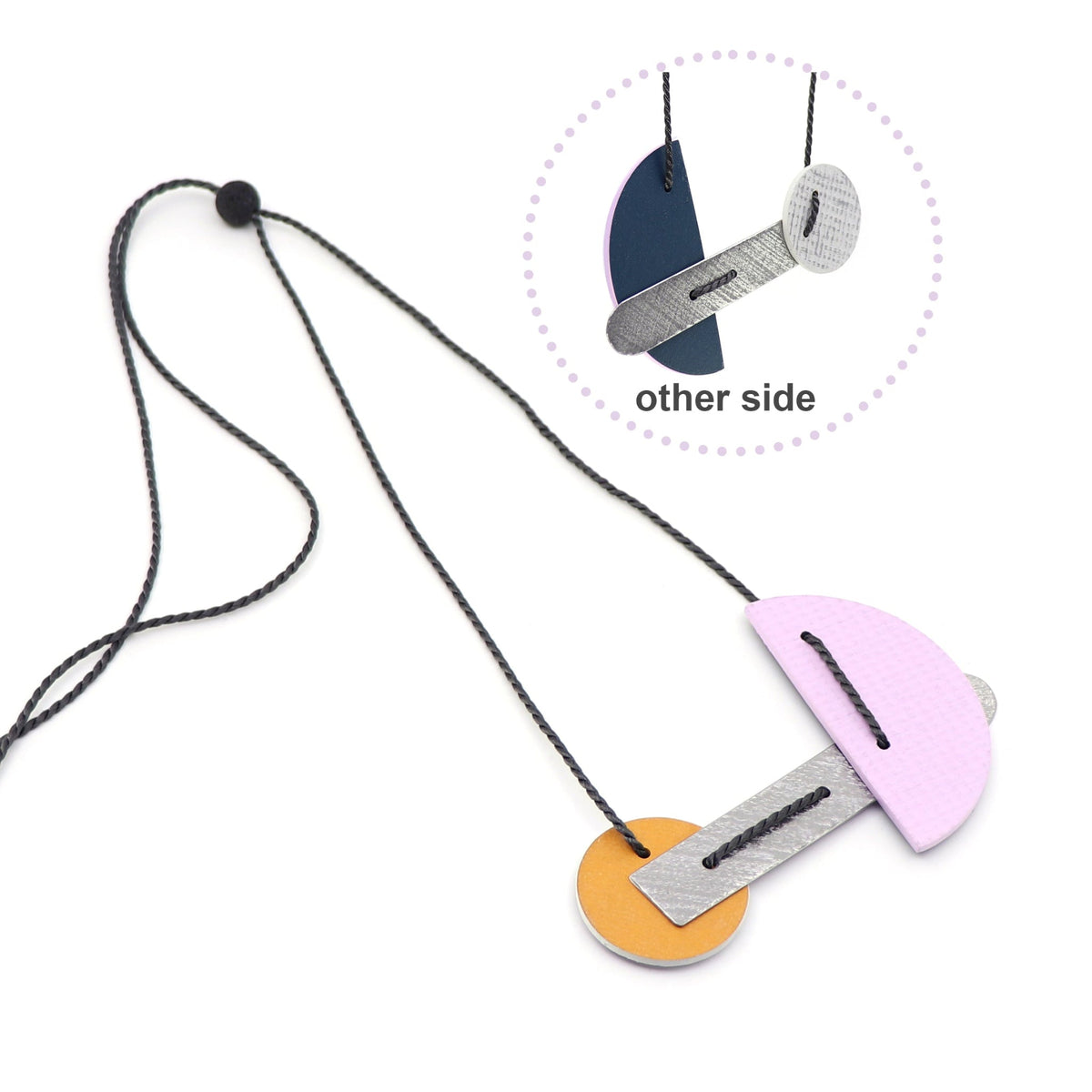 Necklace with colorful pendant on a white background
