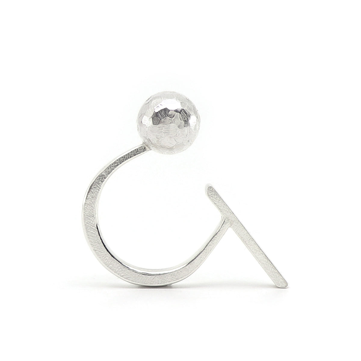 Silver minimalist geometric open ring with a ball on one end of the band and a bar on the other, standing with a white background
