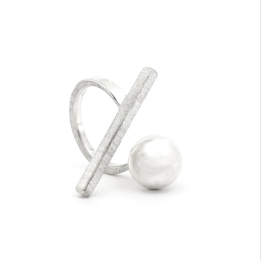 Silver ring with a spherical element on a white background