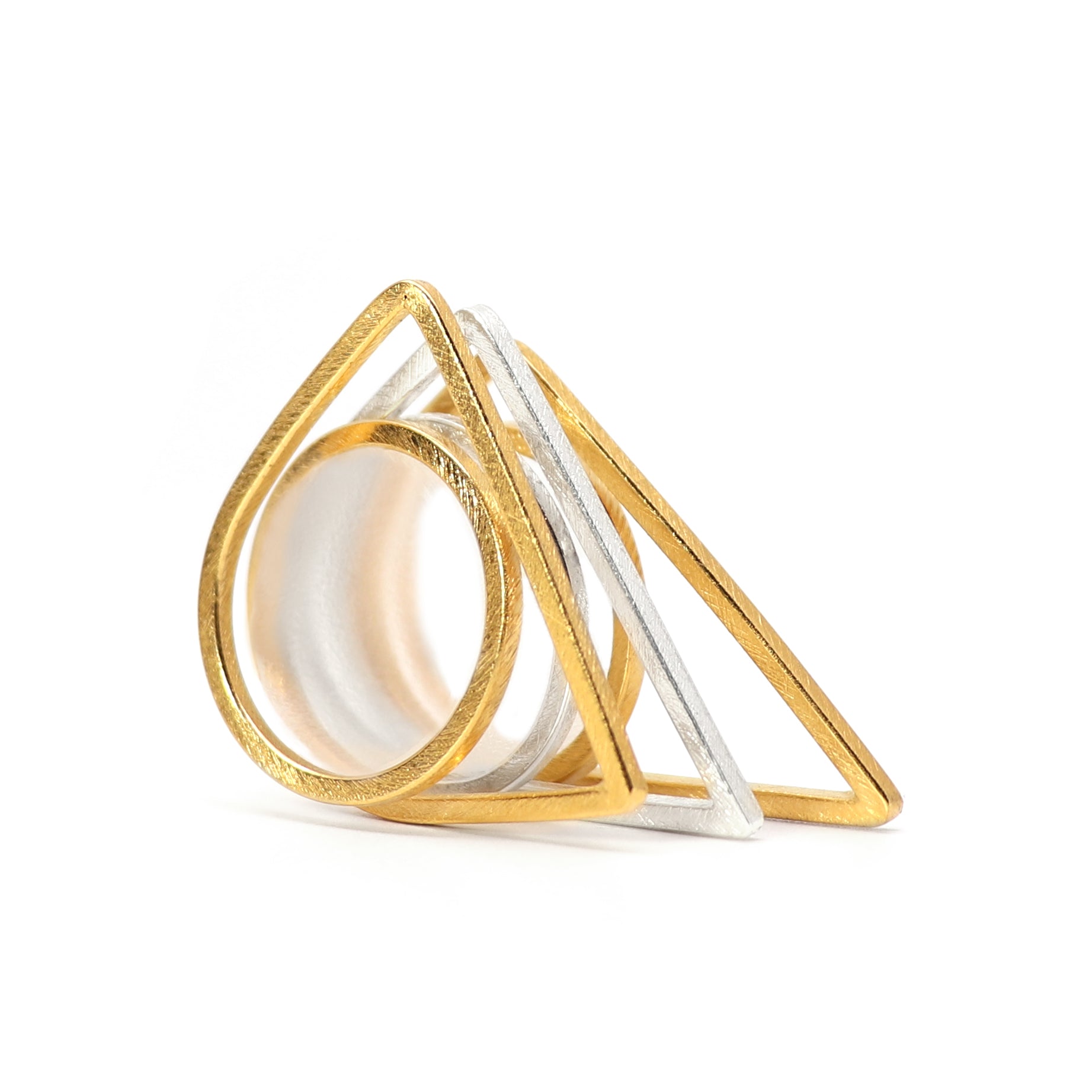 Geometric stacking ring set of 2 Gold and 1 silver ring on a white background