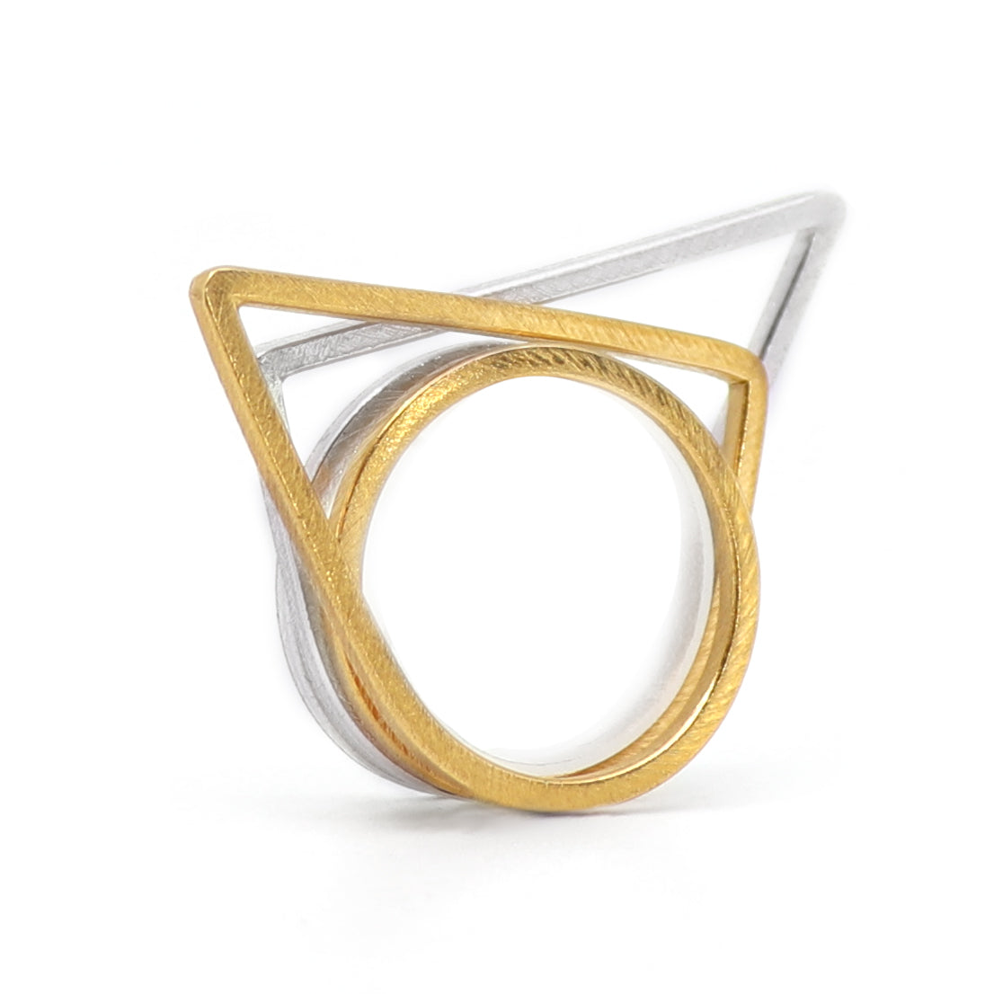 two geometric stacking rings in gold and silver ring on a white background