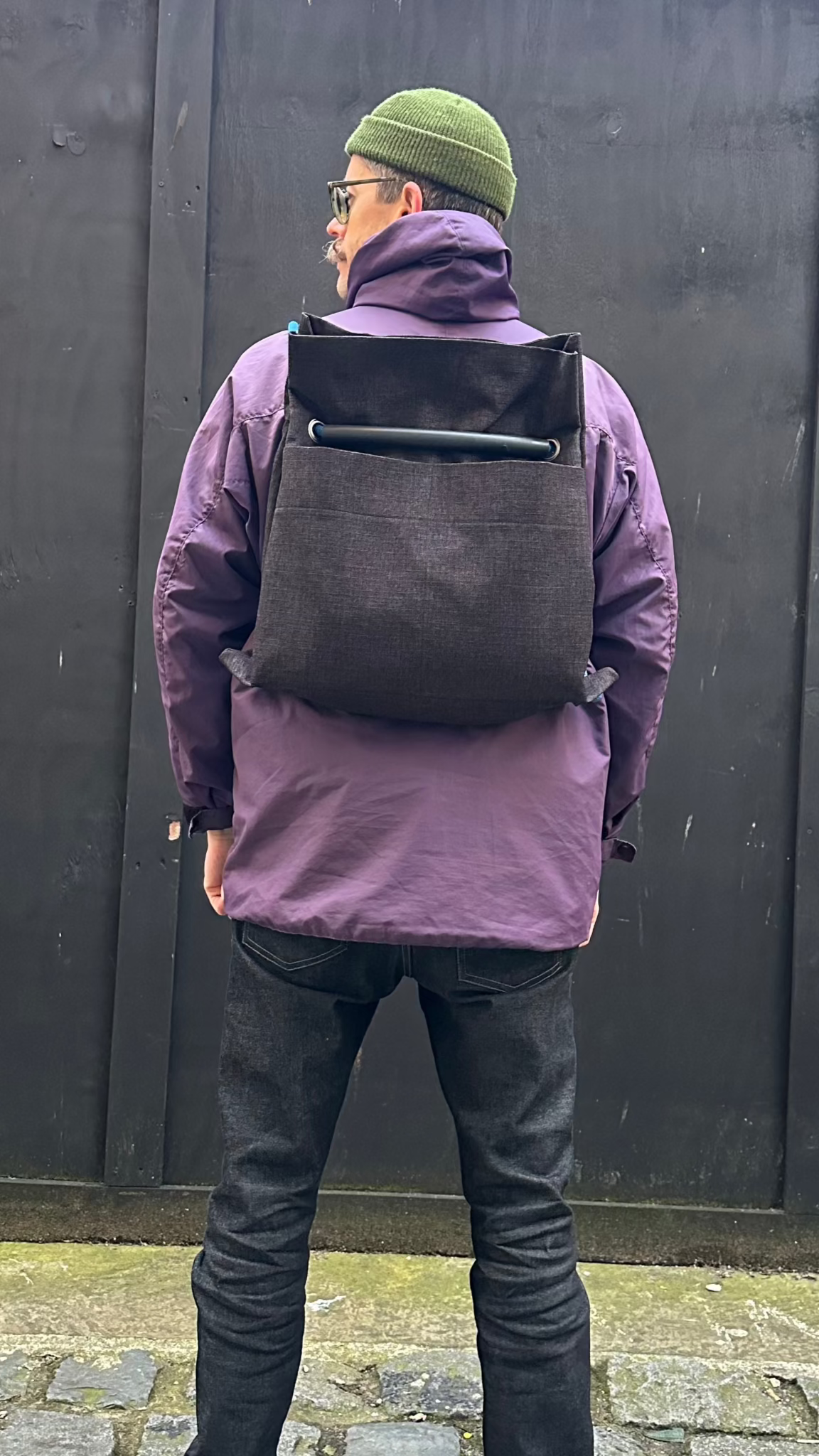 black twill backpack modelled