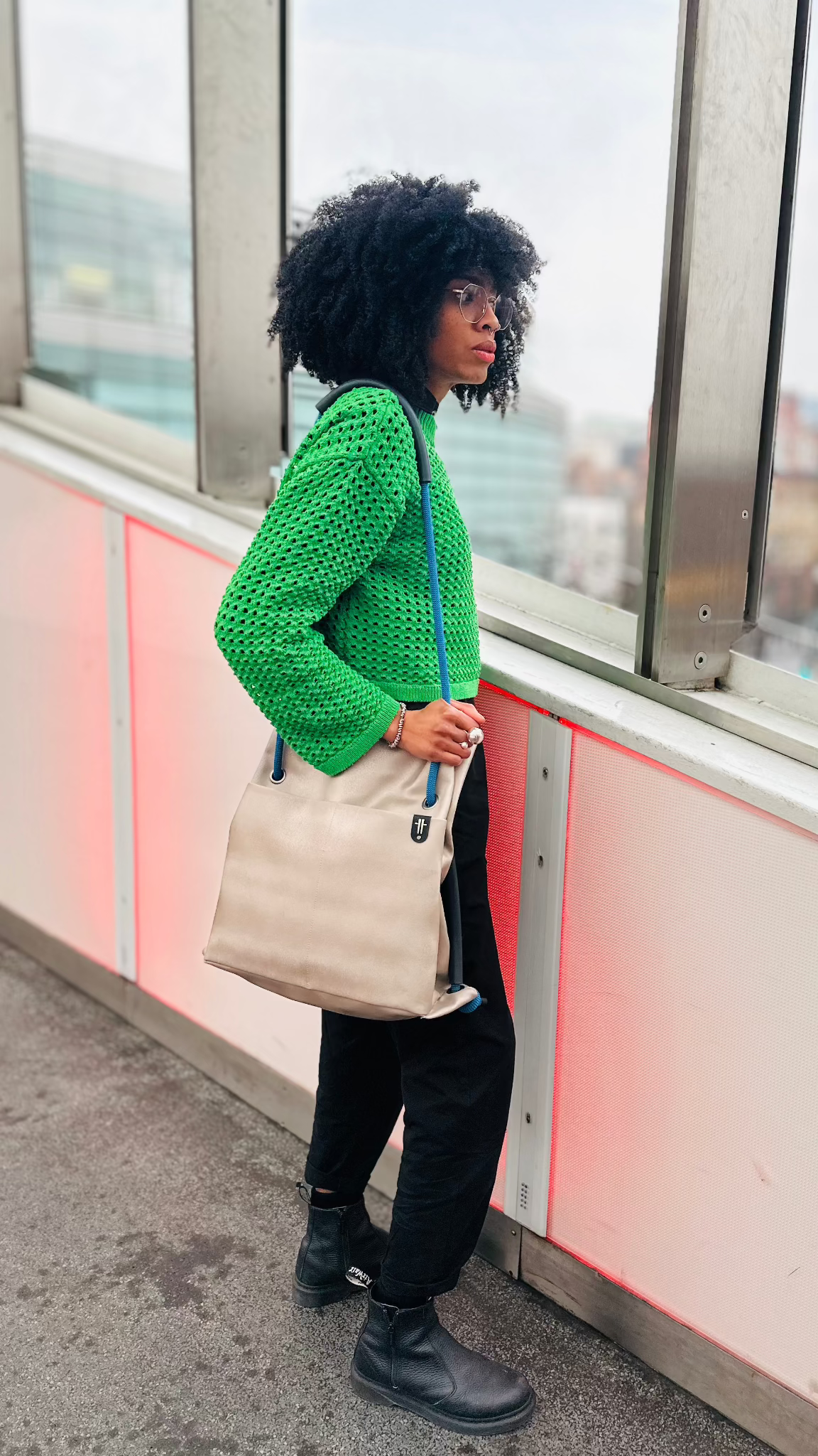 platinum shoulder bag in geometric walkway architecture