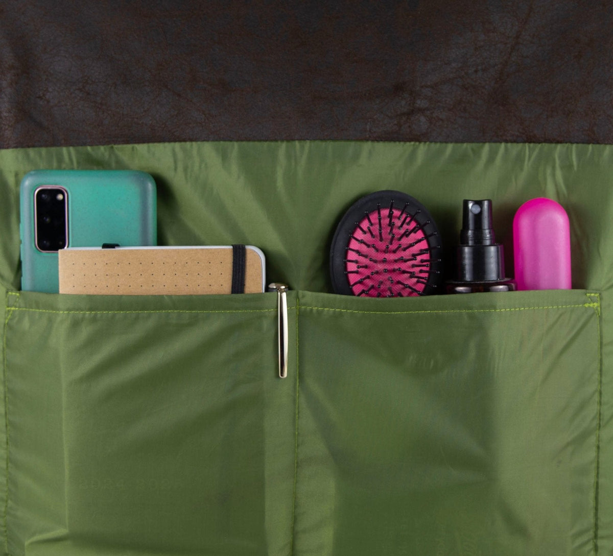 green recycled tent lining with 2 pockets in metro bag