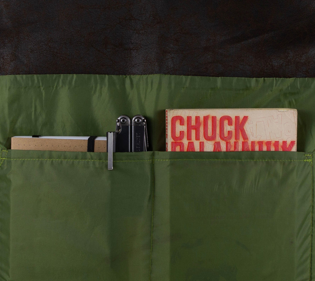 green lining with 2 pockets in metro convertible bag