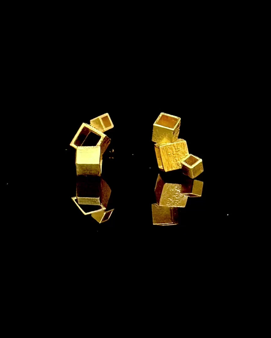 Spinning Tumble cubist gold earring studs