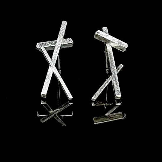 Spinning sticks earrings in silver