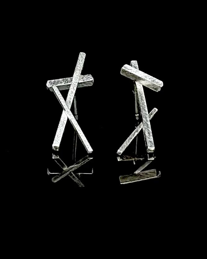 Spinning sticks earrings in silver
