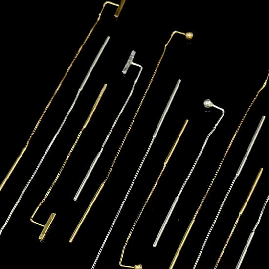 Spinning earlace earrings in sterling and gold