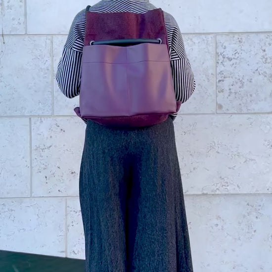 Plum chevron convertible bag from back to shoulder