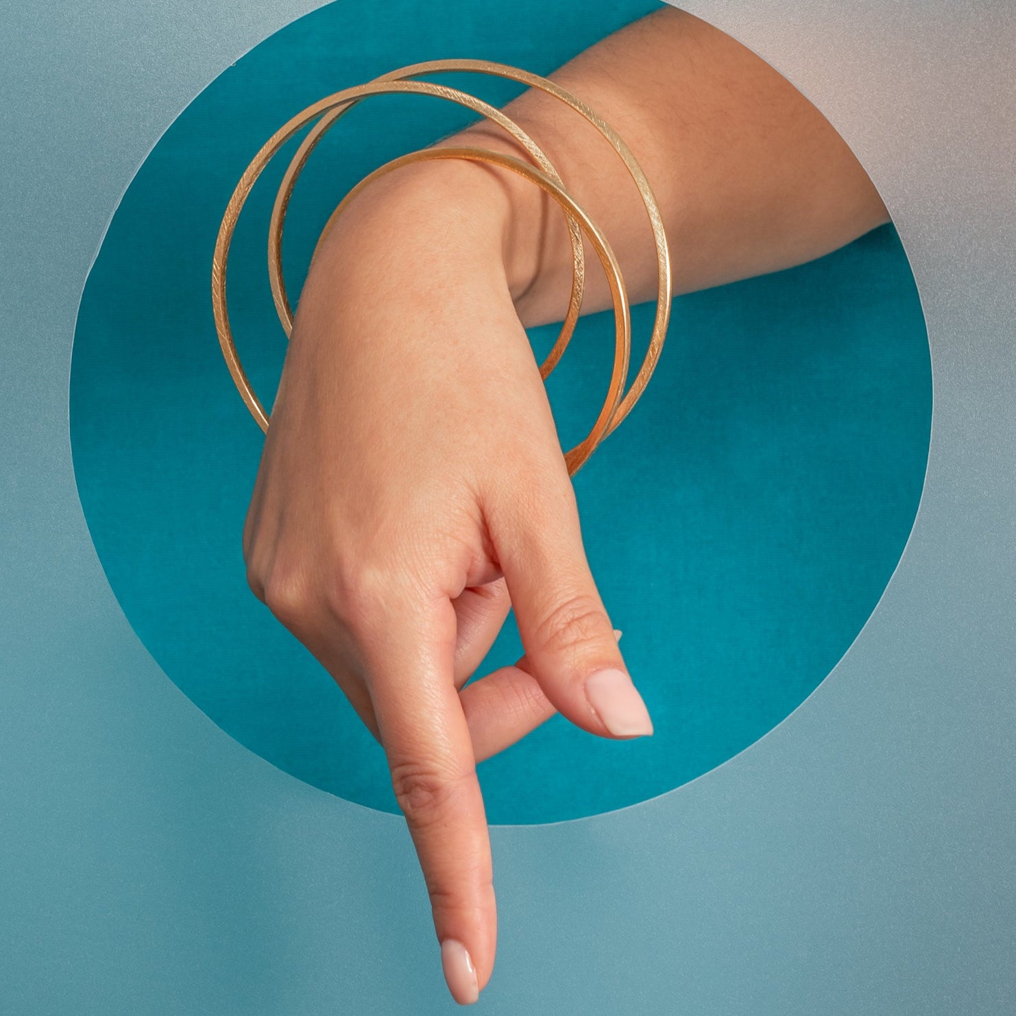 Gold statement bangle modelled